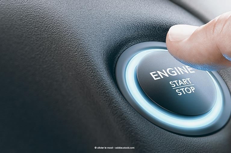 A close-up of an Engine Start/Stop button.