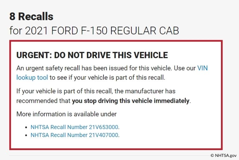 A notice on the website for National Highway Traffic Safety Administration reads: "8 Recalls for 2021 Ford F-150 Regular Cab." "URGENT: Do not drive this vehicle." "An urgent safety recall has been issued for this vehicle. Use our VIN lookup tool to see if your vehicle is part of this recall." "If your vehicle is part of this recall, the manufacturer has recommended that you stop driving this vehicle immediately." "More information is available under: - NHTSA Recall Number 21V653000. - NHTSA Recall Number 21V407000."